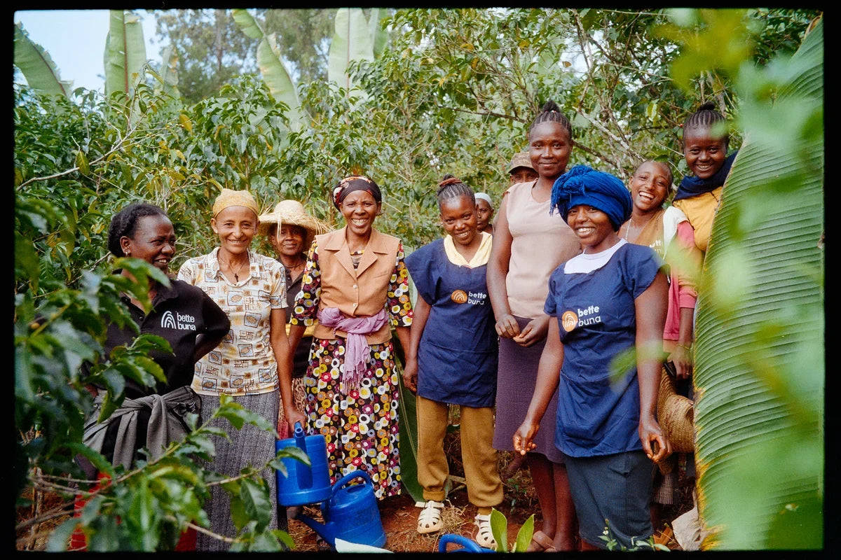 Women farmers and Bette Buna staff together on a coffee plot in Ethiopia